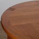 Round extendable dining table in wood published by Monopoly, 1970.