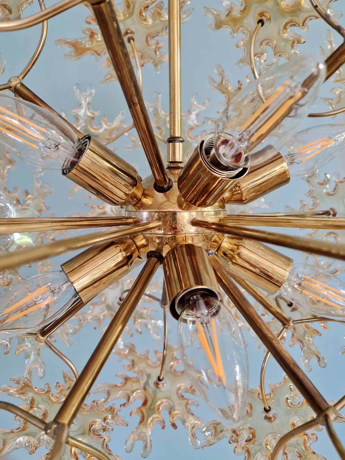 Large Sputnik chandelier in brass and amber Murano glass, SiSche, 1960.