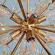 Large Sputnik chandelier in brass and amber Murano glass, SiSche, 1960.