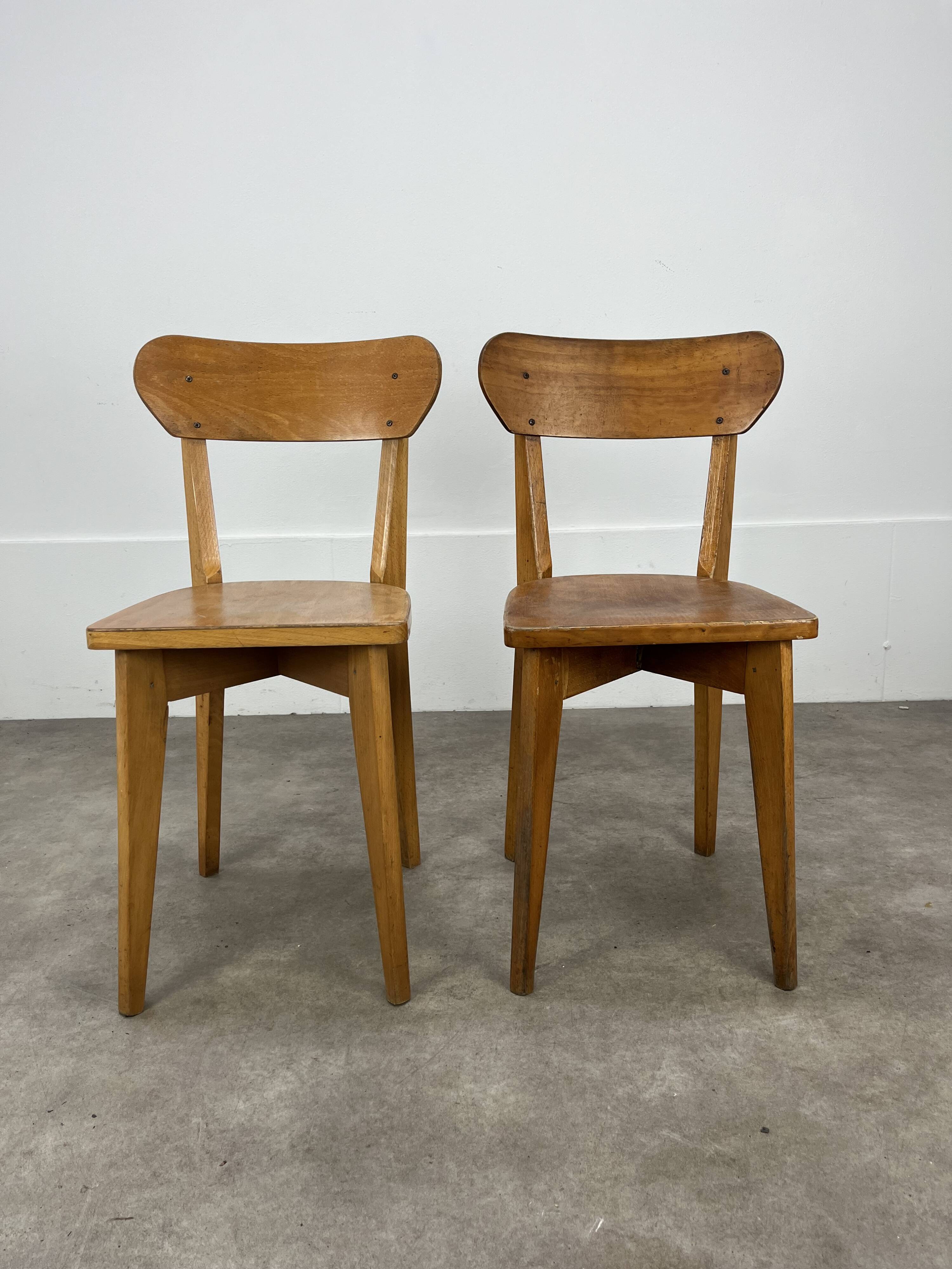 Pair of Luterma bistro chairs, wood, 1950s