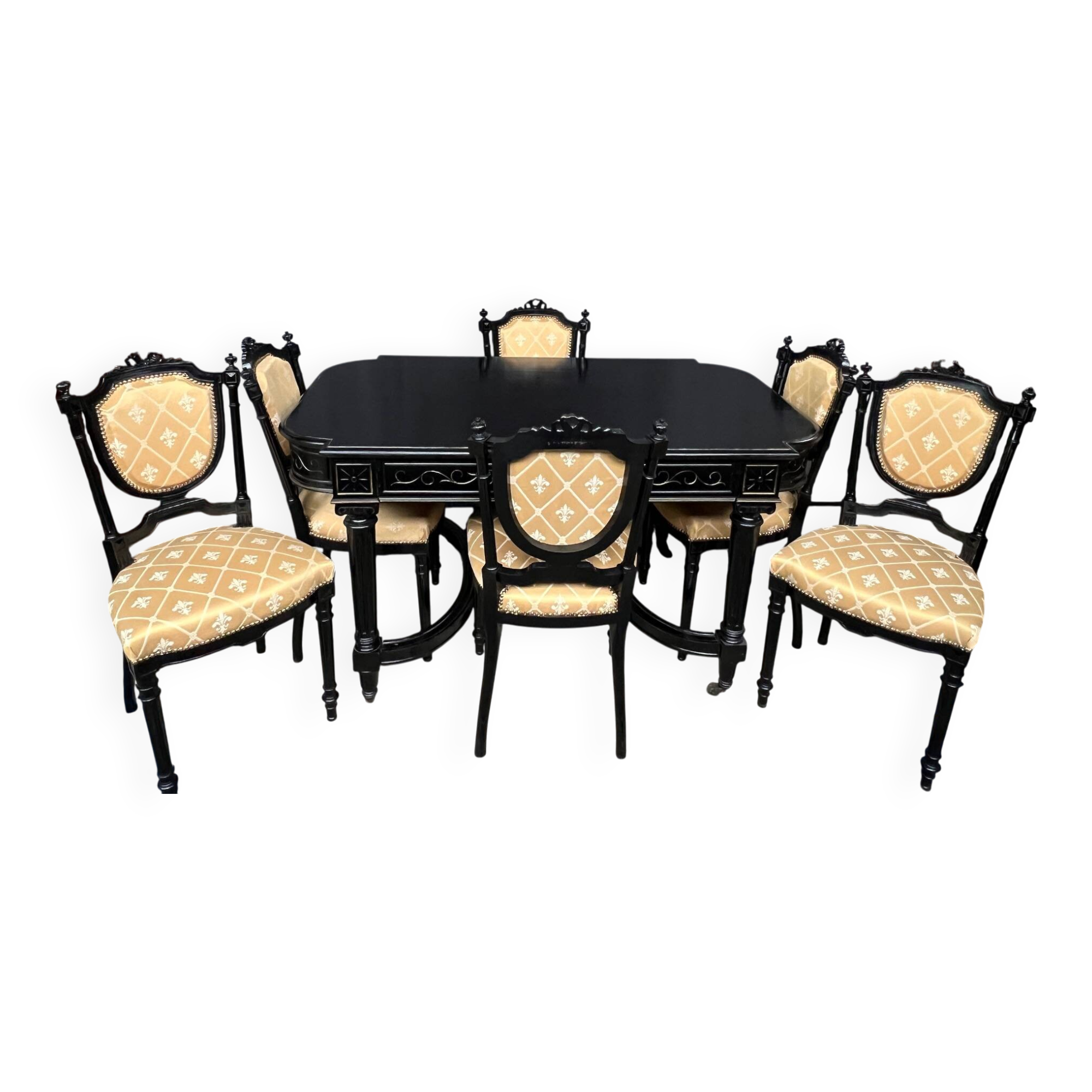 Dining room set consisting of a table and six chairs from the Napoleon III period.