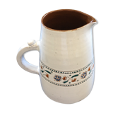 Signed pitcher with floral decoration