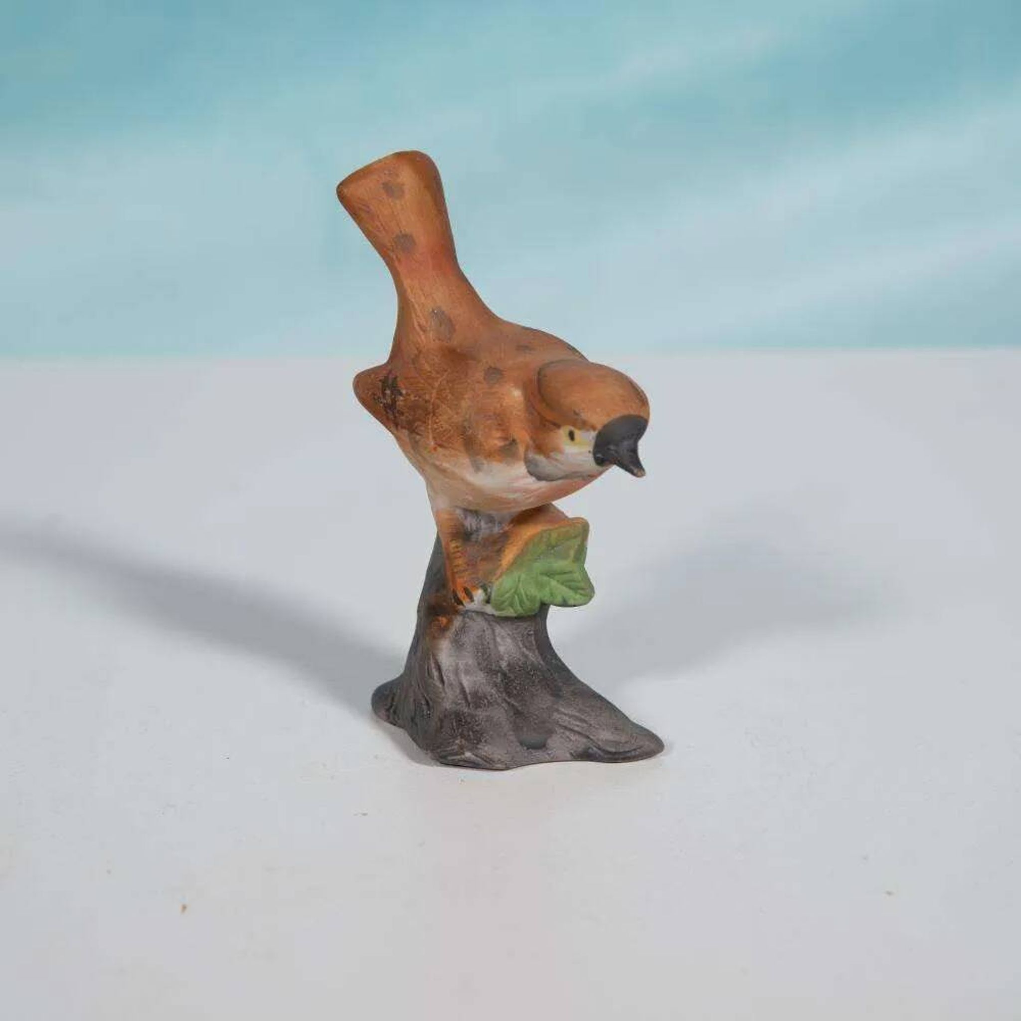 Vintage porcelain bird statuette from the sixties.
