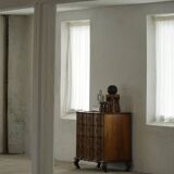 Antique baroque oak commode from the late 18th century with cabriole legs.