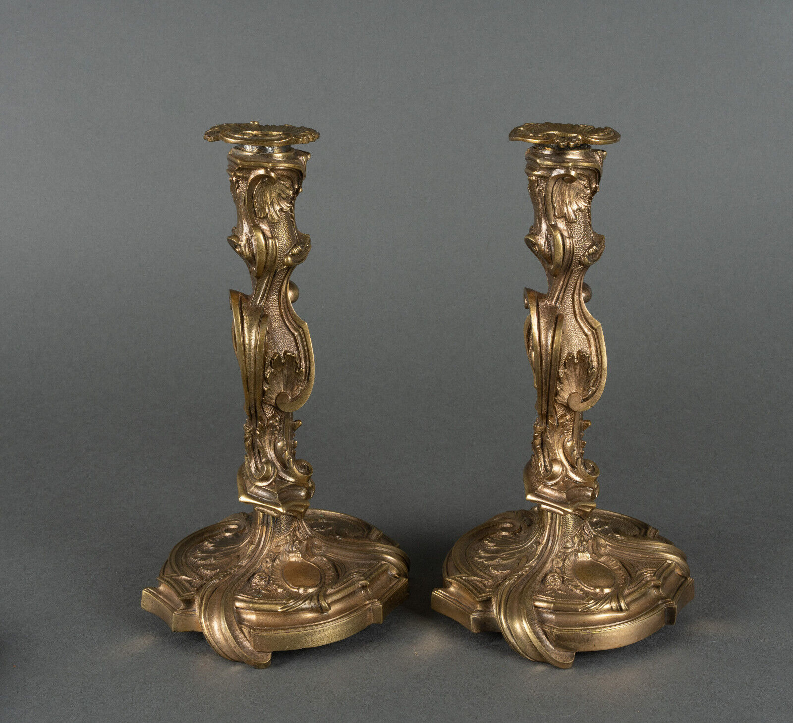 Pair of candlesticks xixth louis xiv ornamentation shells gilded bronze