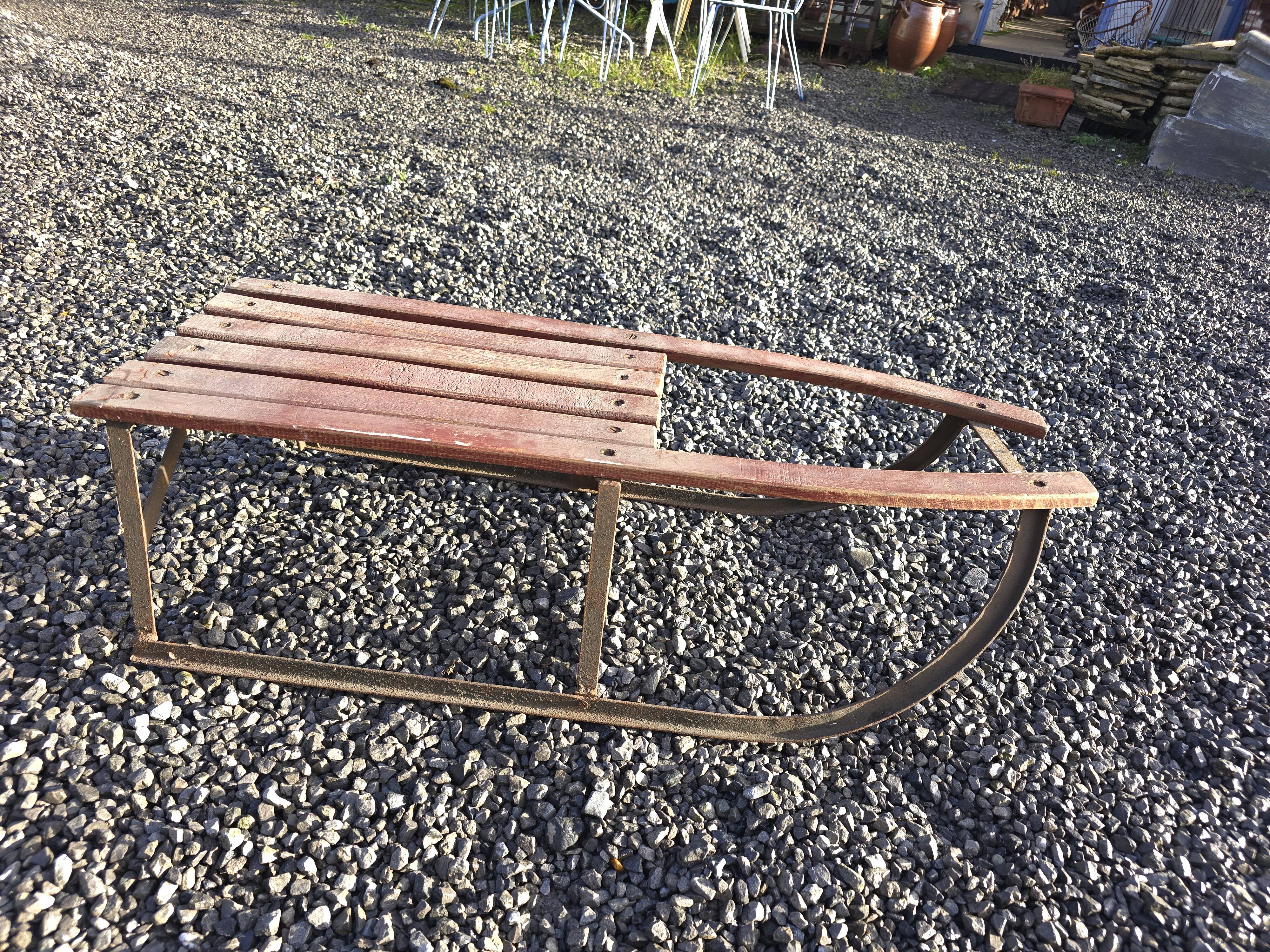 Vintage wooden and iron sled