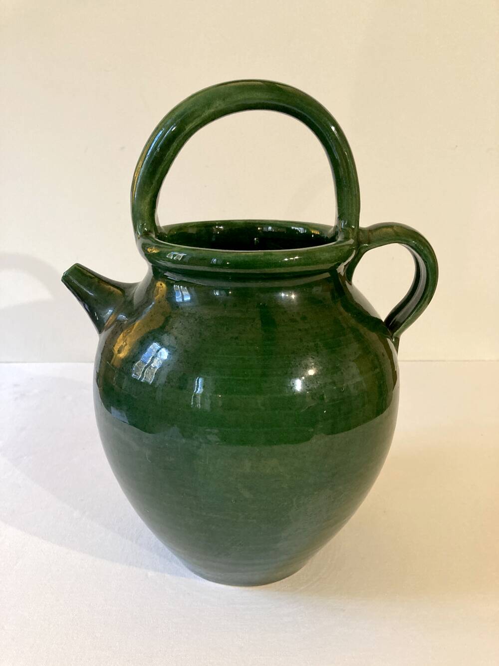 Emerald green glazed terracotta goat jug