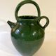 Emerald green glazed terracotta goat jug