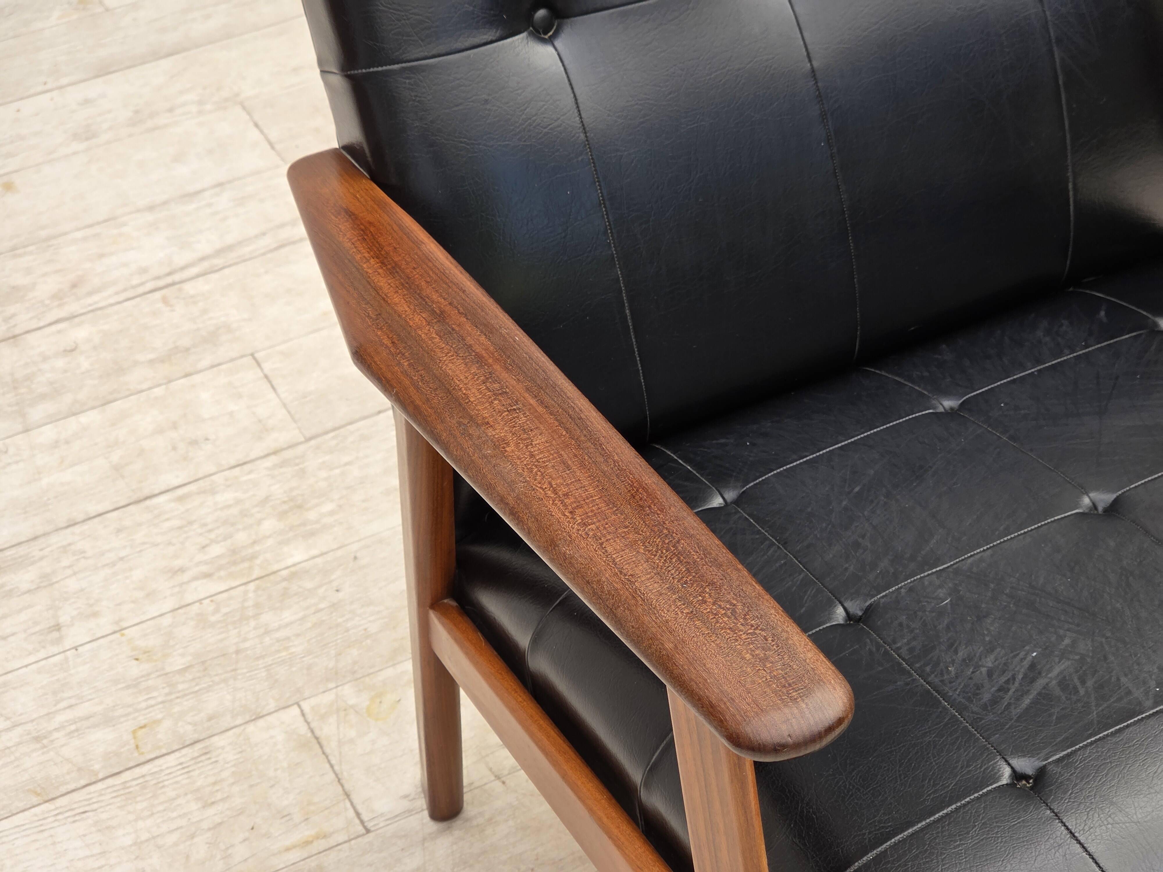 1970s, Danish armchair, black artificial leather, teak wood.