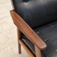 1970s, Danish armchair, black artificial leather, teak wood.
