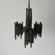 Three-armed suspended lamp in wrought iron, brutalist design, 1960s, Italy.