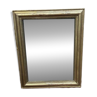 Miroir doré de style Louis XVI