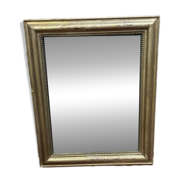 Miroir doré de style Louis XVI