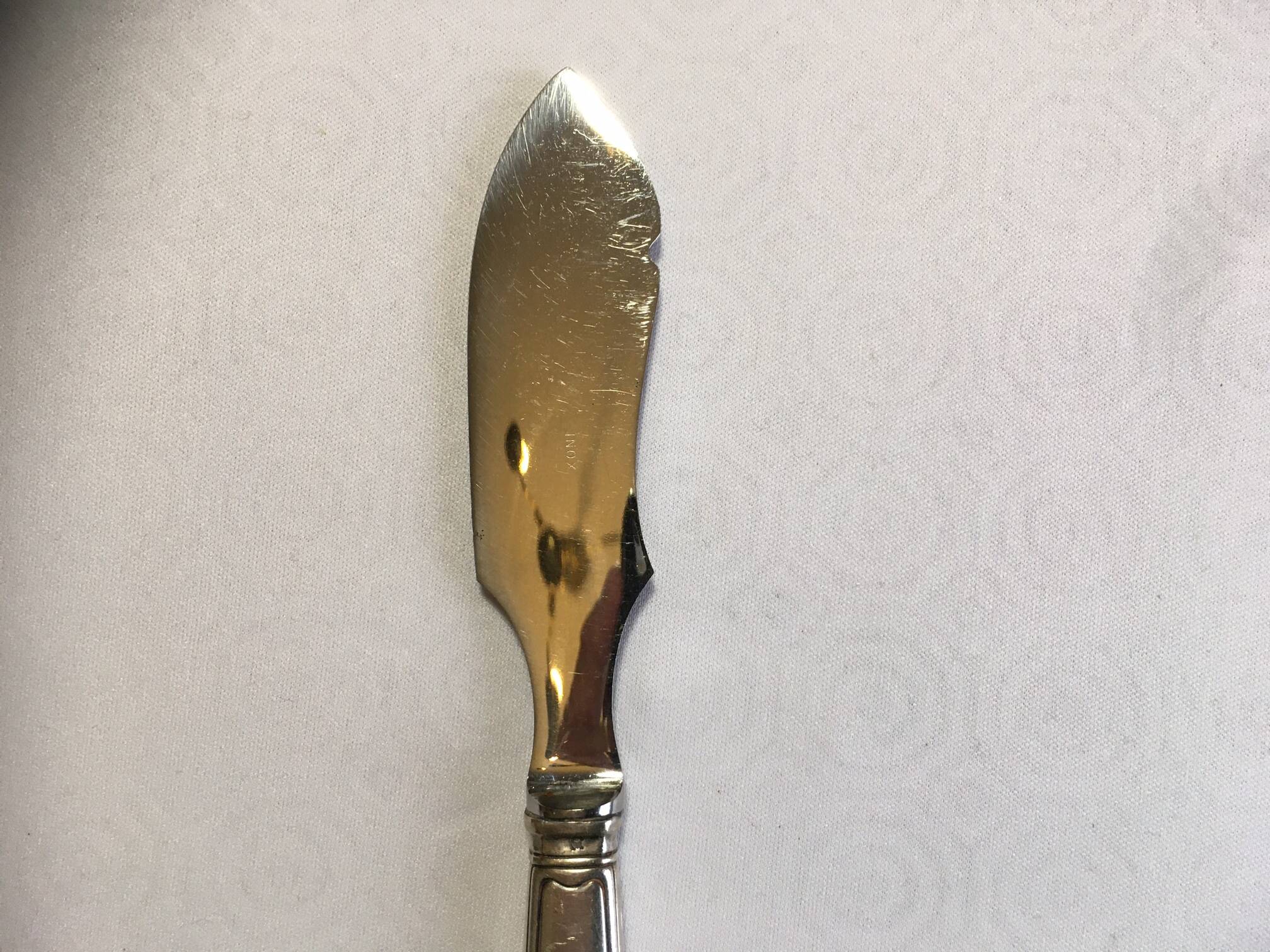 Silver metal cheese knife