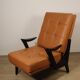 Paire de fauteuils vintage années 50 en bois noir et cuir caramel
