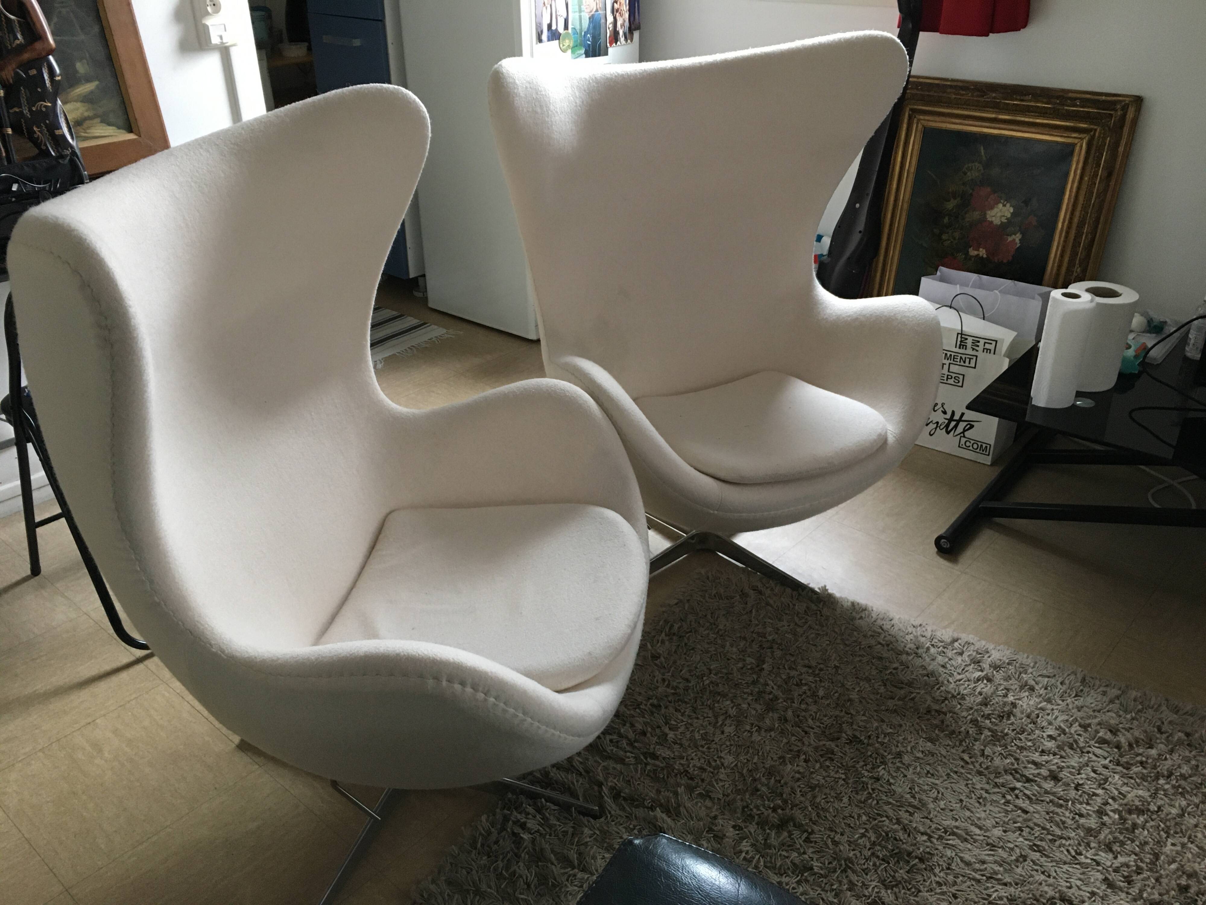 2 white felt egg chairs