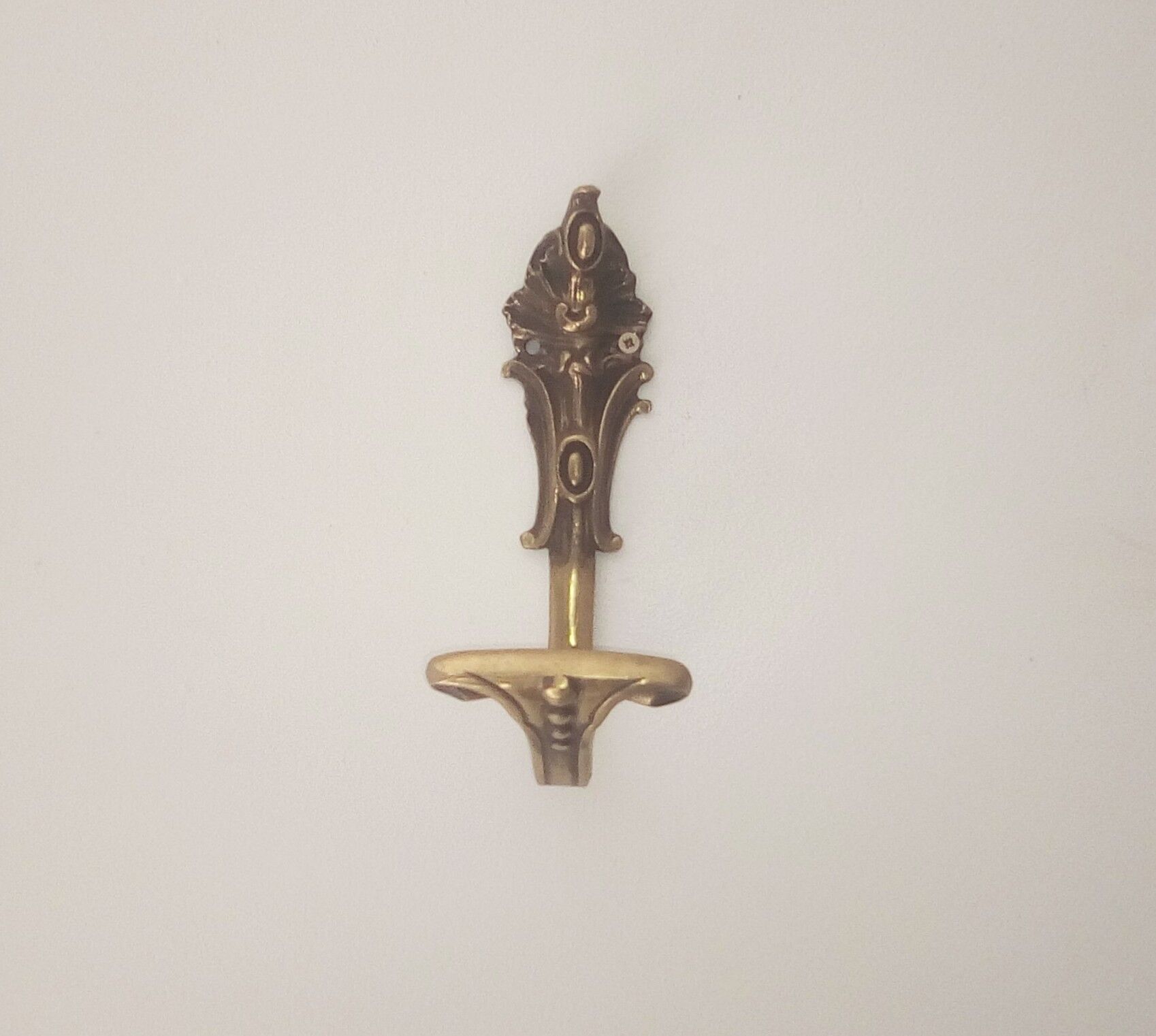 Old brass coat rack hook