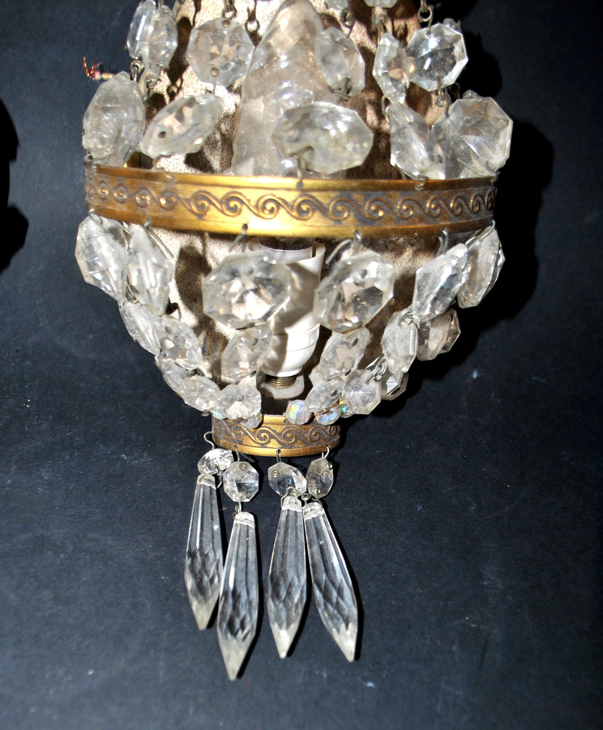 Pair of vintage lamps: wall lights with gold trim and cut crystal.