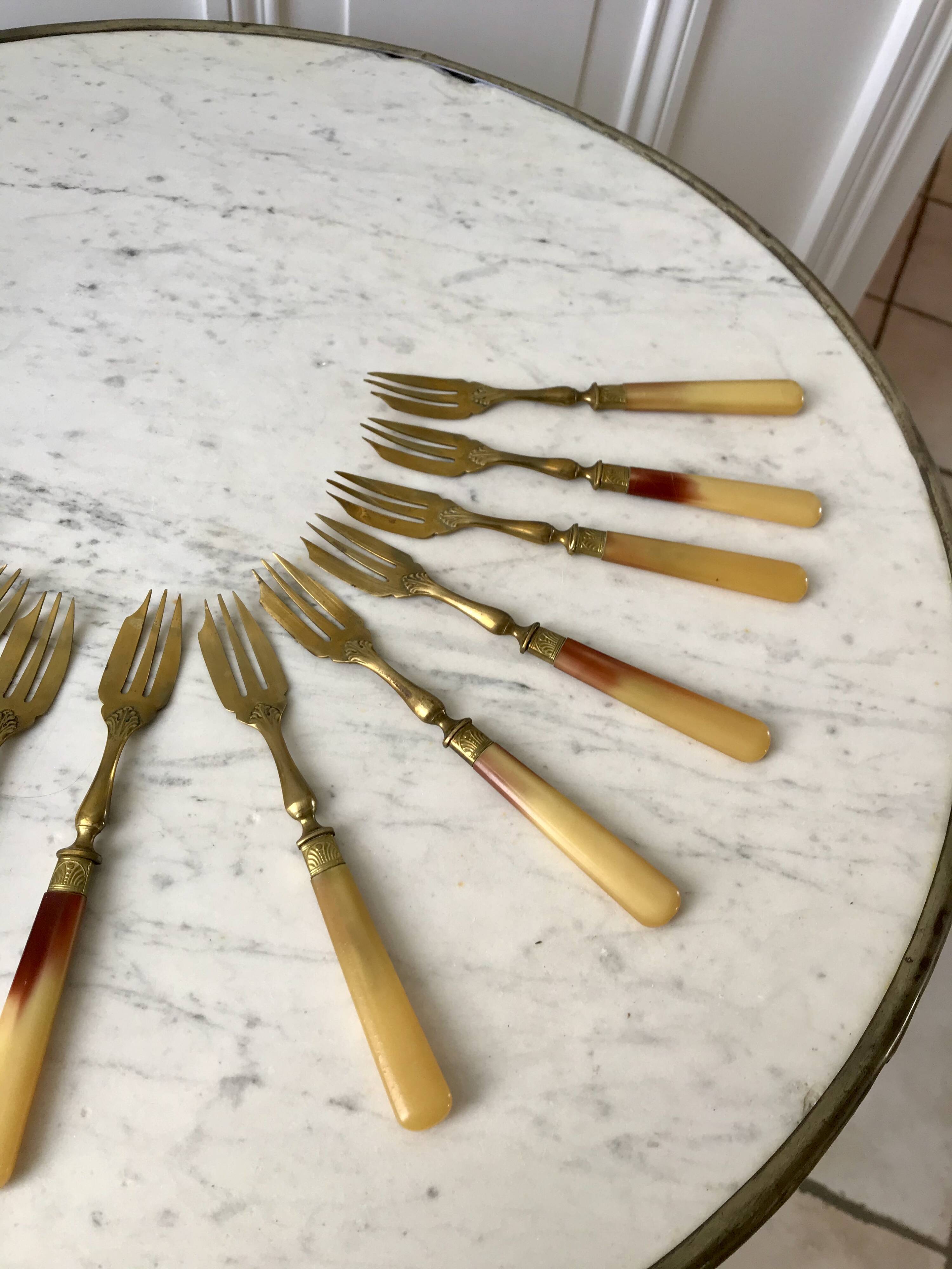 set of 12 horn dessert forks from the 50s