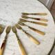 set of 12 horn dessert forks from the 50s