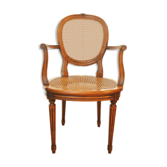 Armchair in wood and caning