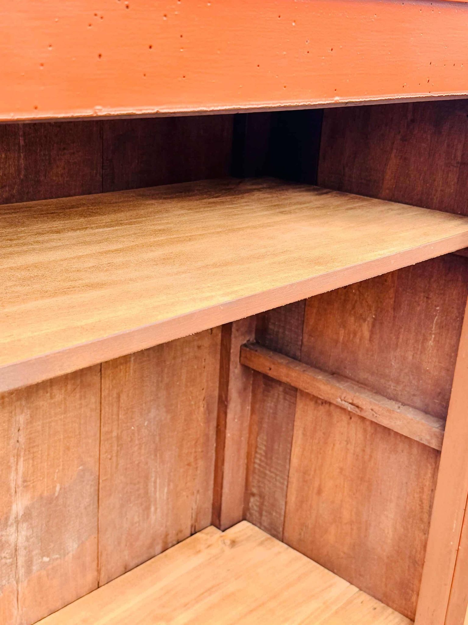 Old terracotta-colored bonnet maker