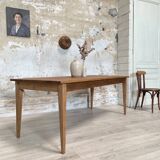 Vintage farm table with spindle legs.