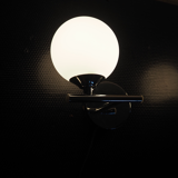 Pair of sconces with an opaline globe and chrome structure from the 1970s