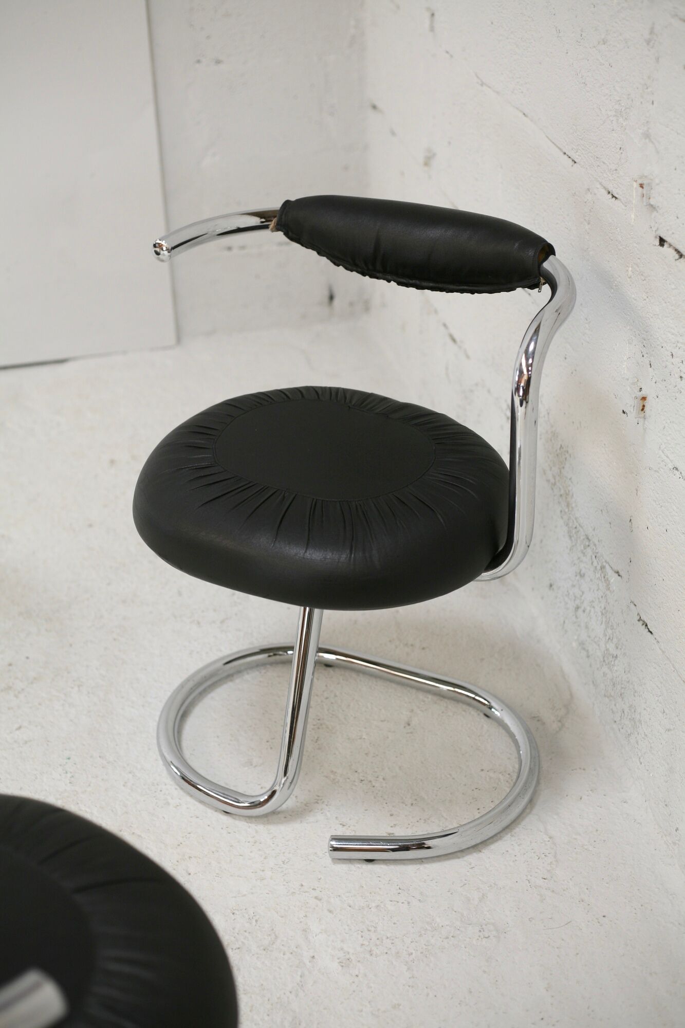 4 chairs tubular steel, imitation black leather, Italy, circa 1970