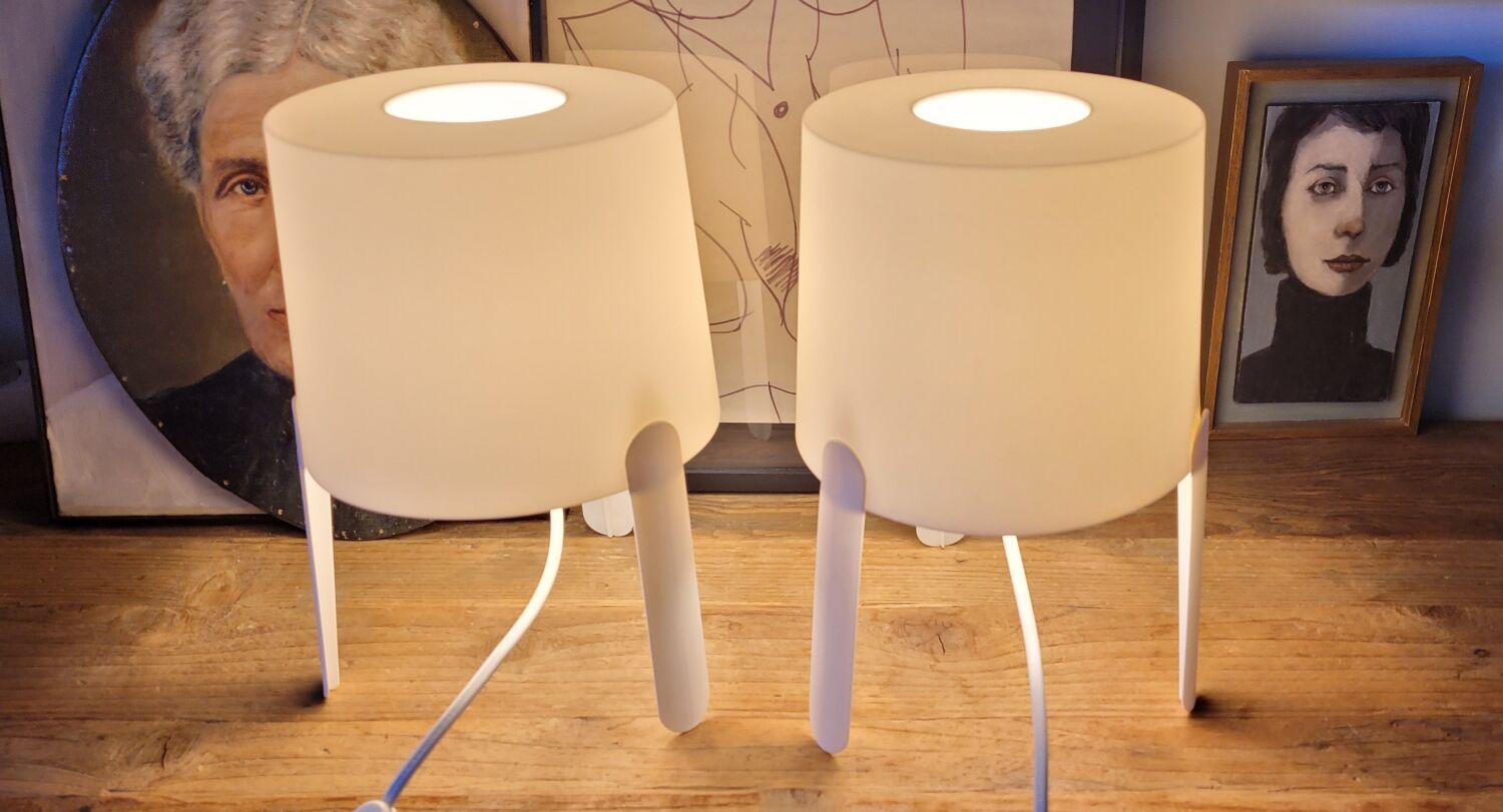 Pair of white Ikea Tvärs bedside lamps
