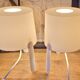 Pair of white Ikea Tvärs bedside lamps