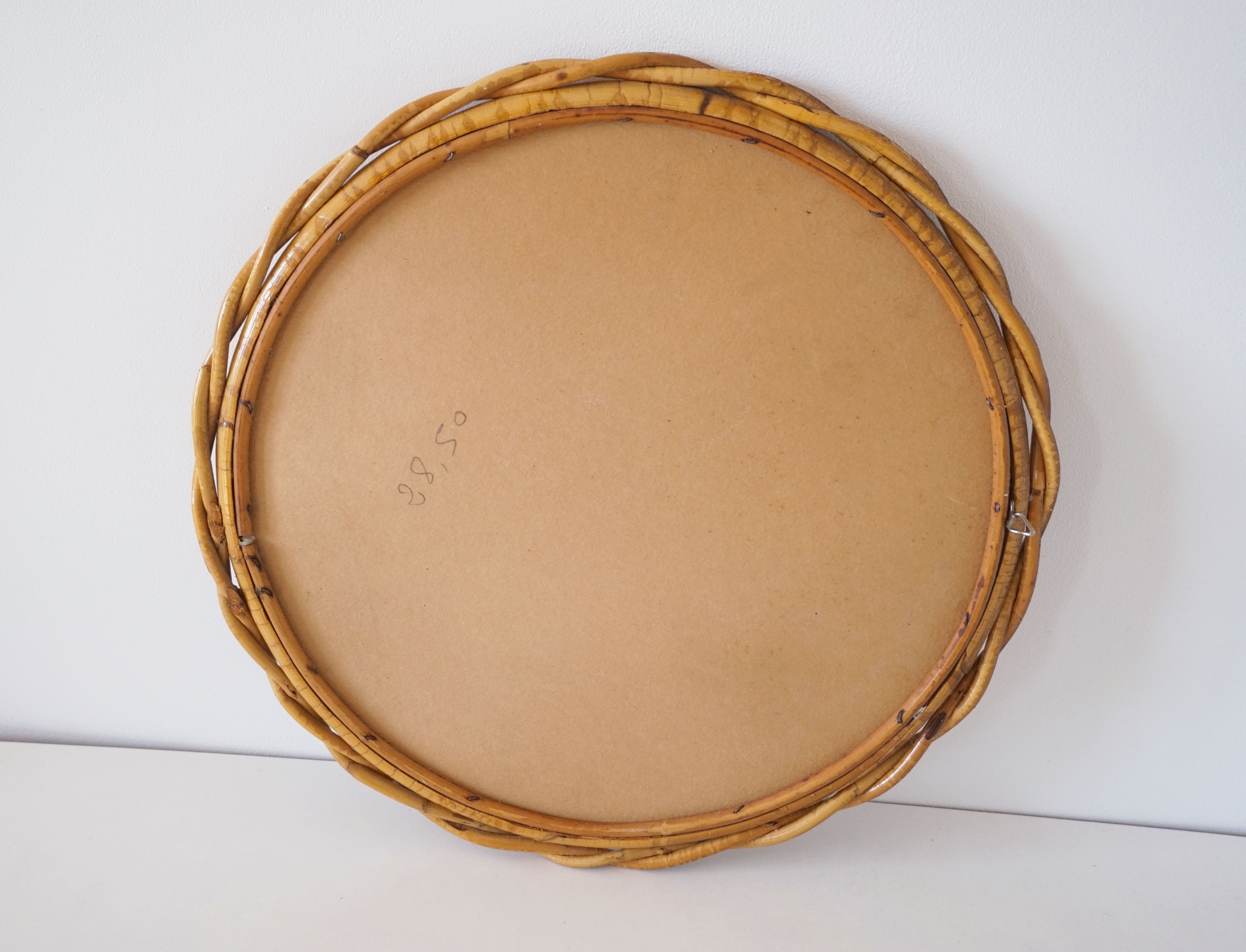 Vintage rattan sun mirror