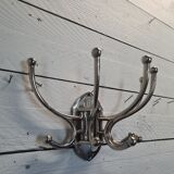 Circular chromed metal coat rack