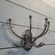 Circular chromed metal coat rack