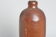 Bouteille en grès marron