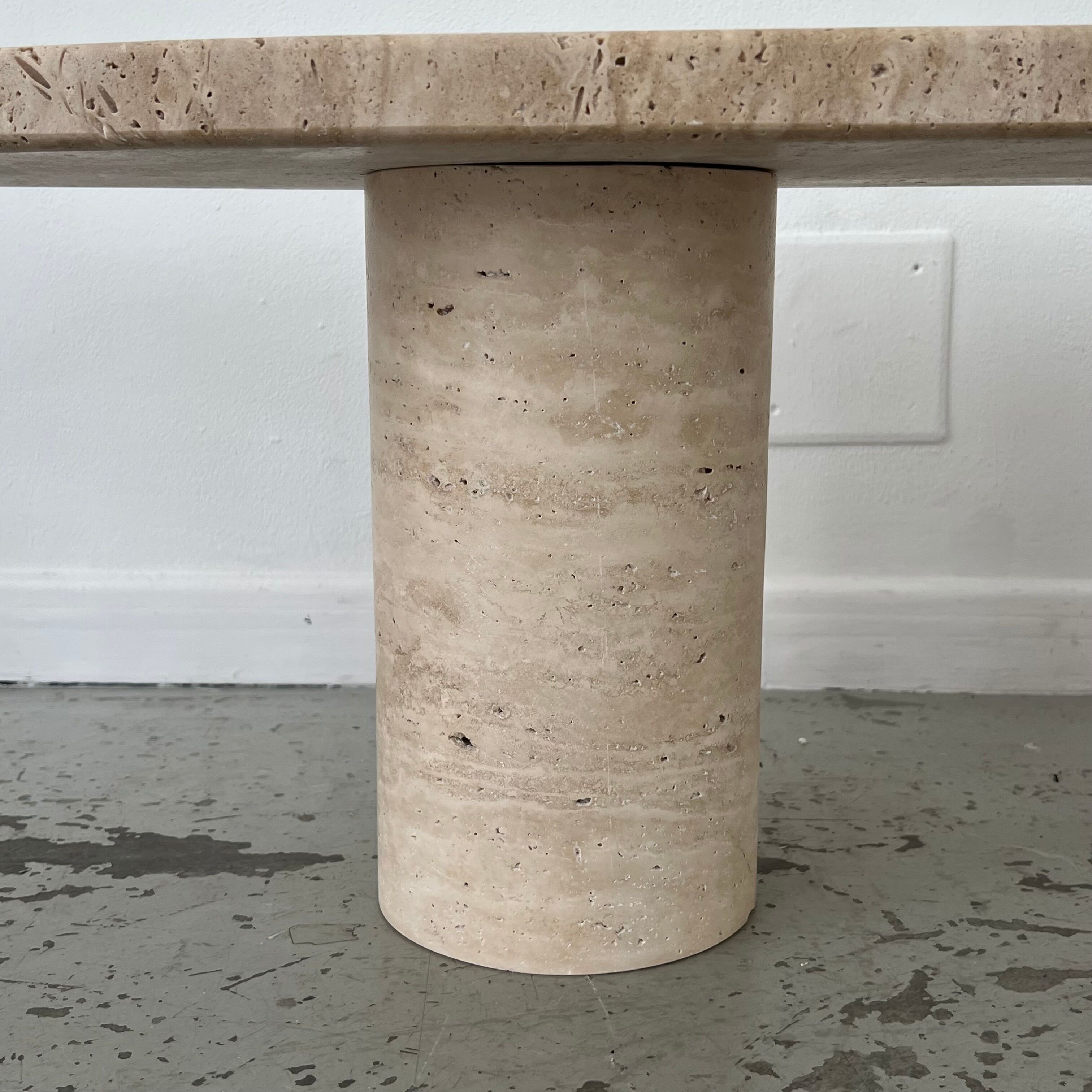 Oval travertine coffee table