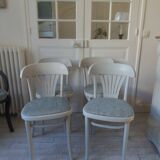 Set of 4 vintage bistro chairs enhanced in pearl grey.