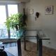 High table with tempered glass and chrome base.