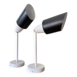 Pair of adjustable industrial metal wall sconces.