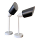 Pair of adjustable industrial metal wall sconces.
