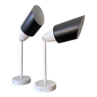 Pair of adjustable industrial metal wall sconces.