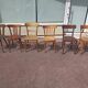 Set of 12 mismatched wooden bistro chairs