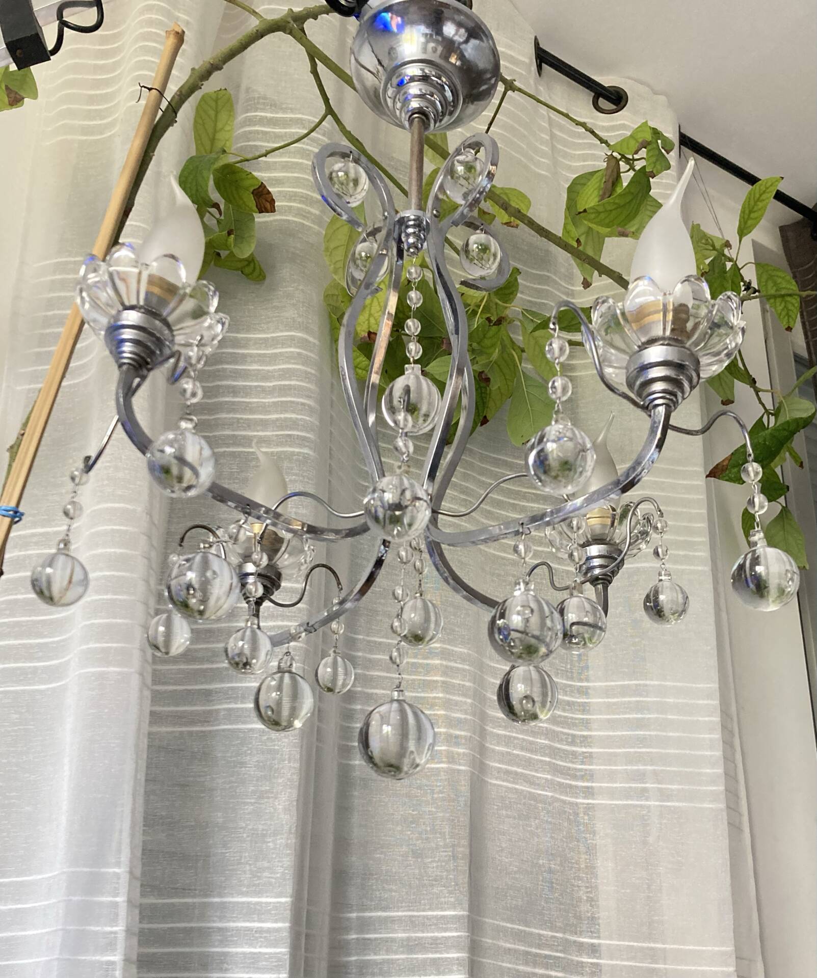 Art Deco chandelier from the early 20th century in chrome brass, with glass pendants.