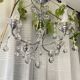 Art Deco chandelier from the early 20th century in chrome brass, with glass pendants.