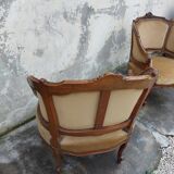 Pair of armchairs basket louis XV in carved walnut