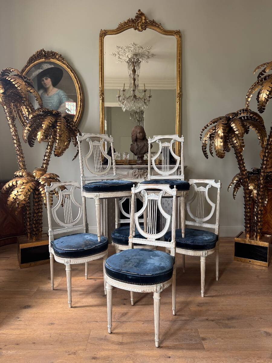 Set of 6 lyre chairs from the Napoleonic III period in painted wood in the Louis XVI style.