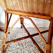1950s 60s rattan armchair with green apple and black piping.