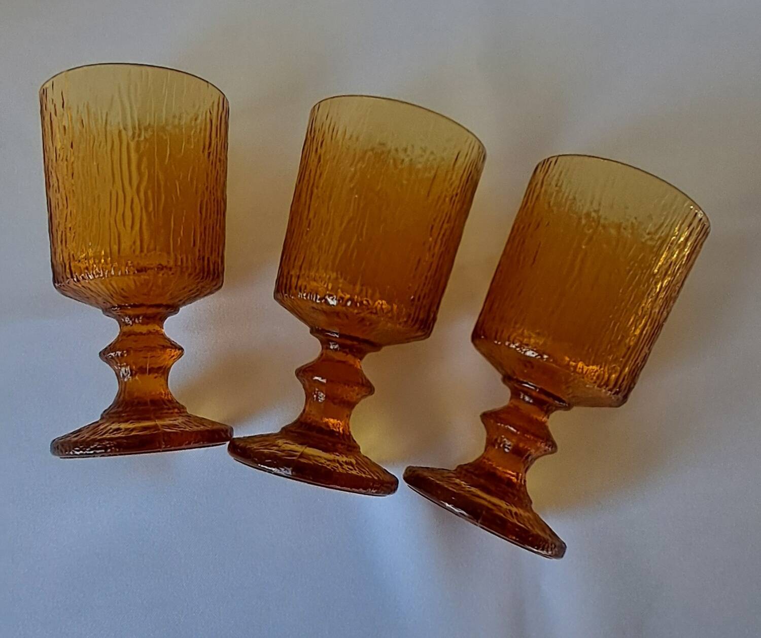 3 textured amber stemmed glasses. Vintage.