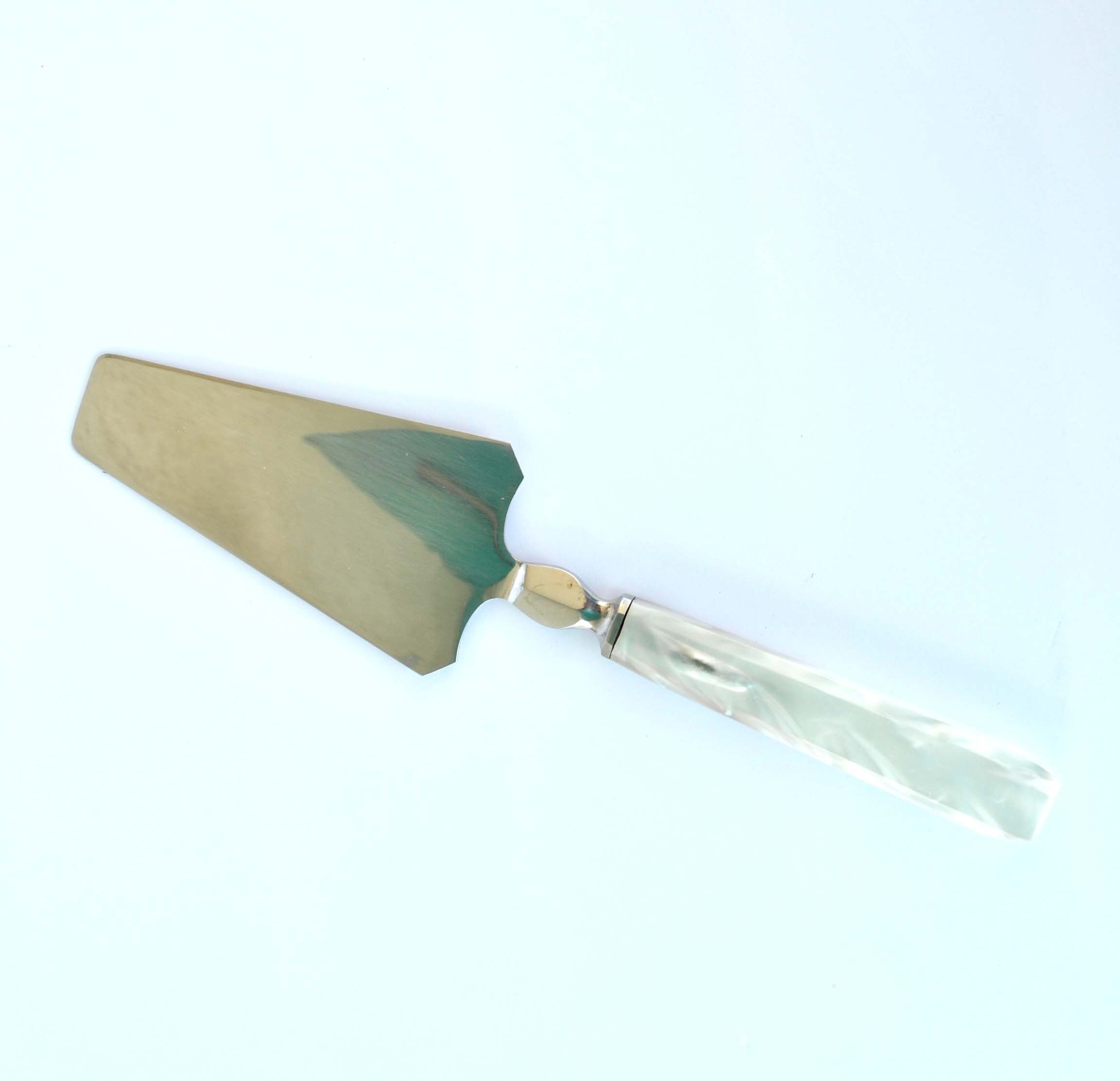 Vintage pie shovel by Streisguth in stainless steel and pearly resin handle