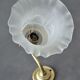 Brass gooseneck wall lamp and tulip lampshade